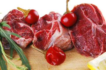 raw meat chunk on wood