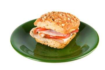 Bread roll with chicken and tomatoes