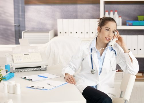 Female doctor on the phone