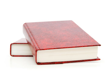 Leather-bound books isolated on the white background