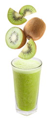 Slices of kiwi falling into a glass of fresh juice
