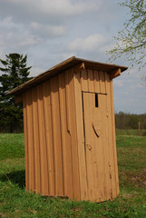 Brown wooden WC