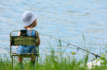 Little boy with fishing rod