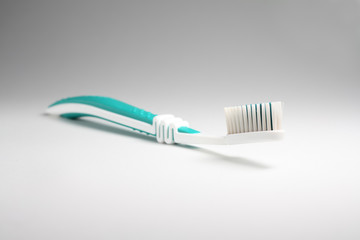 Toothbrush at light background