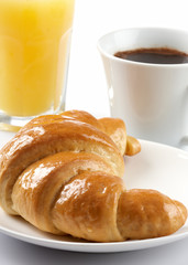 Breakfast with coffee and croissant