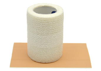 Mullbinde auf Heftpflaster