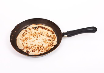 Pancake cooking in a pan