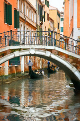Gondolas on canal in Venice