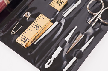 Sewing kit closeup isolated on white