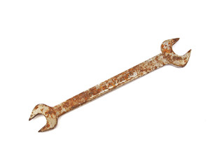 Rusty spanner  on a plane white background.