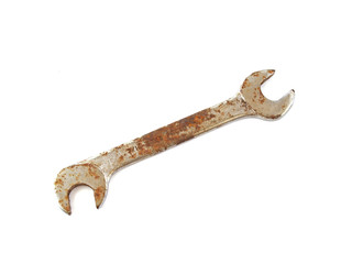 Rusty spanner on a plane white background.