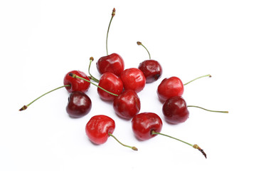 Fototapeta na wymiar several sweet cherries on white