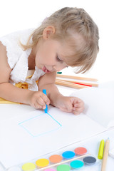 Girl draws on the album.