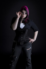 Goth girl holding glasses