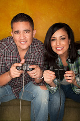 Hispanic Couple Playing Video game
