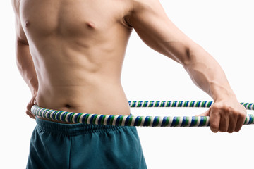 Man playing hula hoop