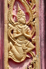 Thai art on pillar of temple, Kantarawichai, Mahasarakam