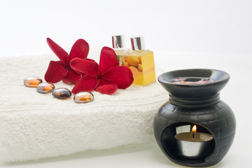 Fototapeta na wymiar spa Concept - A set of aroma therapy on the white towel