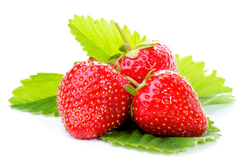 Strawberries with leaves isolated on white background
