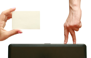 fingers go to a business card in hand
