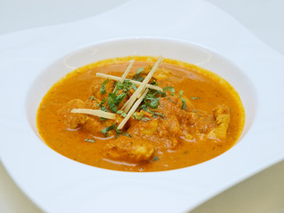 chicken curry soup with fresh ginger slices