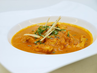 chicken curry soup with fresh ginger slices