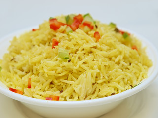 a bowl full of rice curry