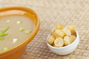 Cream of mushroom soup and bread croutons