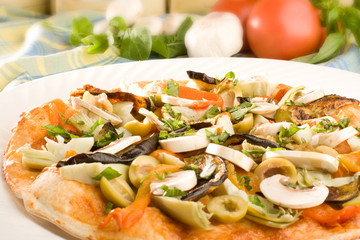 Vegetarian Pizza with mushrooms, olives and artichokes