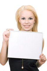 Fototapeta premium Young blonde smiling woman with blank.