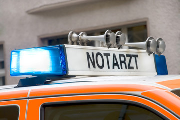 roof of a german emergency car with blue light