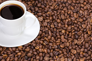 cup at coffee beans