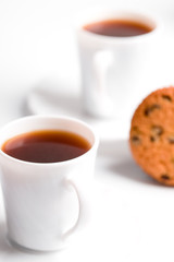 two cups of coffee and muffin