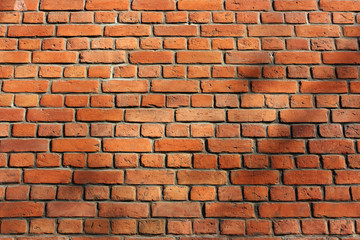 Century years old brick wall of Roman Catholic church