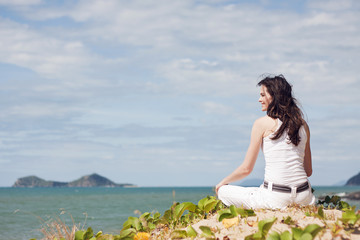 Beautiful woman relaxing on tropical beach