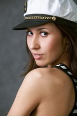 Close-up portrait of a woman as a sea captain