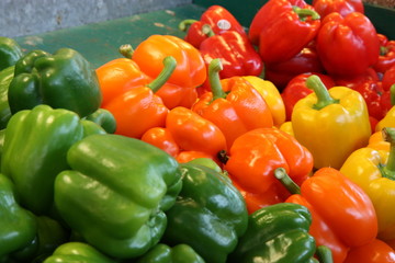 Obraz na płótnie Canvas Peppers Of All Colors at a market