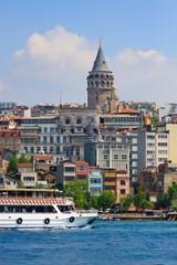 Galata Tower and Ferry cruising harbor, Istanbul, Turkey