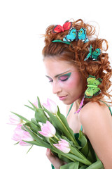 Naklejka premium Red-haired woman with flowers and butterflies on her head