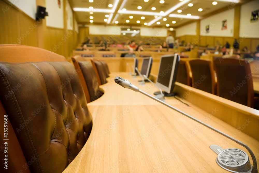 Wall mural conference halls with magnificent leather armchairs and tables