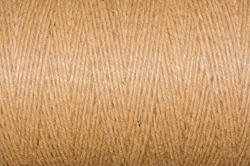 Natural background - a bobbin with rough cord