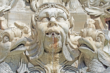fountain with head and fish