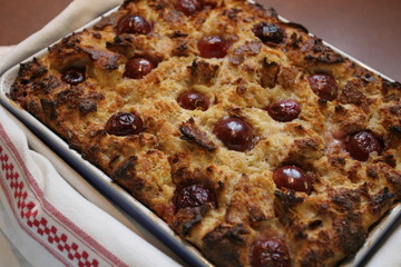 Soufflé with bread and cherries, baked pastries