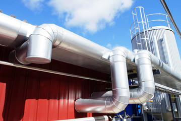 Industrial zone, Steel pipelines on blue sky