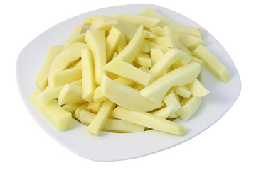 Plate of raw french fries isolated on white