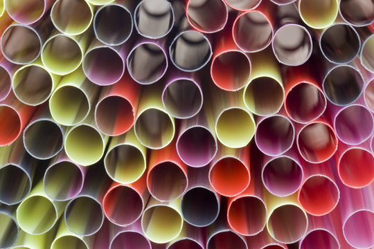 background of coloured drinking straws