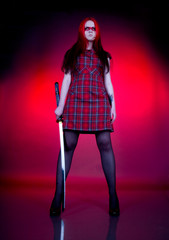 Fototapeta na wymiar Girl with red hair and a sword