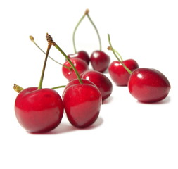 Juicy cherries isolated on white background