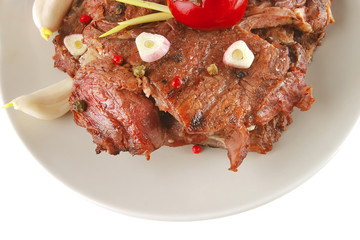 served beef on grey dish