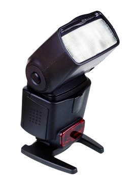 Photo of the camera flashgun isolated on the white